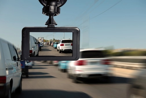 dashcam installed on a car pointing at the road