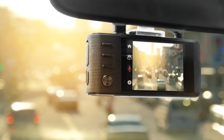 Dashcam pointing at the street from a car