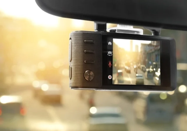 Dashcam pointing at the street from a car