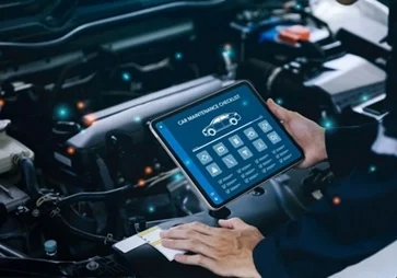 a man holding a tablet with all the specs of a car